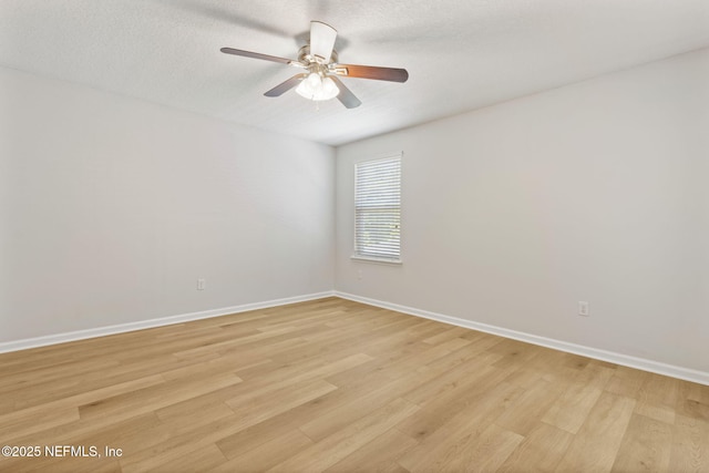124 Sarah Elizabeth Dr, Saint Johns, FL 32259 - empty room featuring light wood finished floors, a textured ceiling, baseboards, and ceiling fan