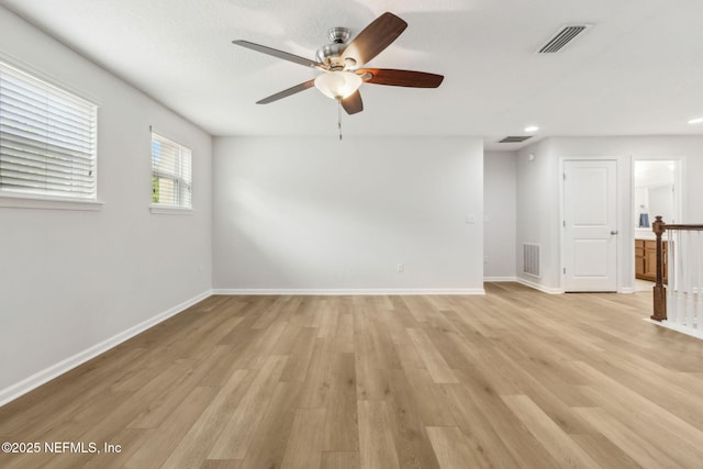 124 Sarah Elizabeth Dr, Saint Johns, FL 32259 - spare room with visible vents, light wood-style flooring, and baseboards