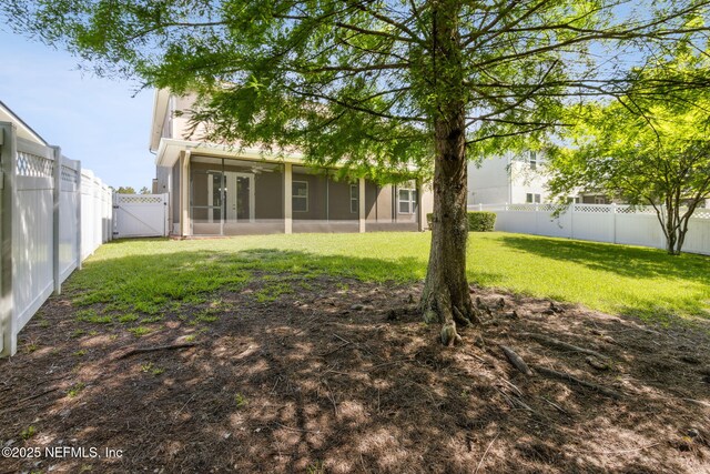 124 Sarah Elizabeth Dr, Saint Johns, FL 32259 - back of property with a gate, a yard, stucco siding, a fenced backyard, and a sunroom