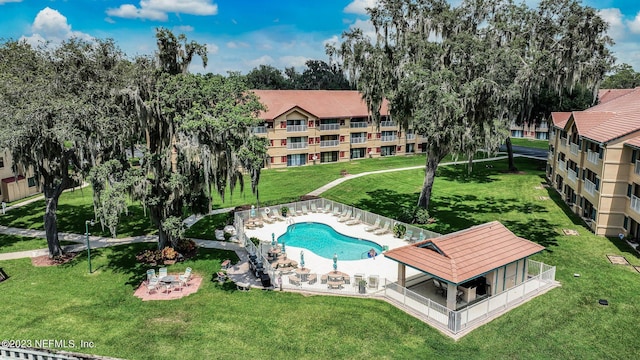 99 Broad River Pl Unit 1301, Welaka, FL 32193 - community pool with a patio area and a yard