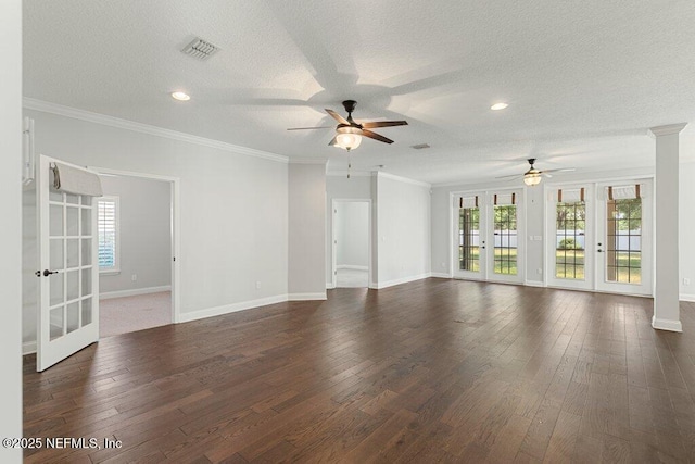 unfurnished living room featuring a ceiling fan, french doors, dark wood-type flooring, baseboards, and a textured ceiling