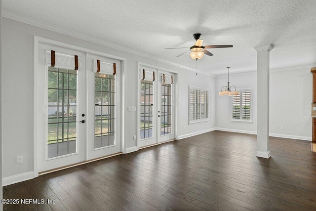 unfurnished living room with french doors, ceiling fan, dark wood-style floors, decorative columns, and crown molding