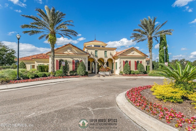 mediterranean / spanish-style house with stucco siding