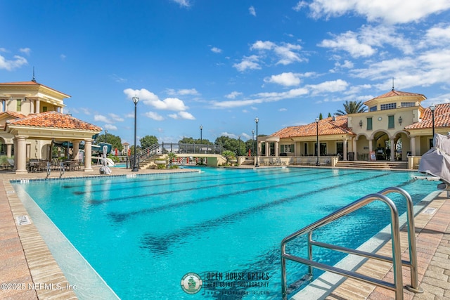 community pool with a patio