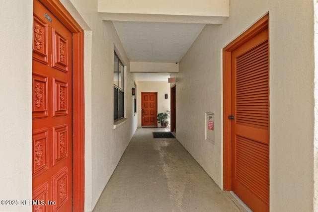 hallway with finished concrete flooring