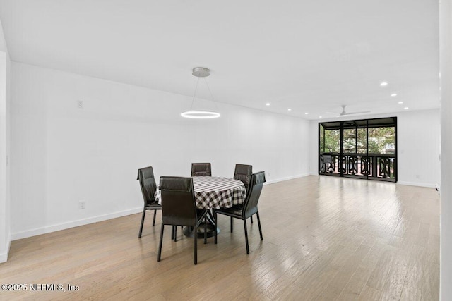 dining space featuring a ceiling fan, baseboards, recessed lighting, and light wood-style floors