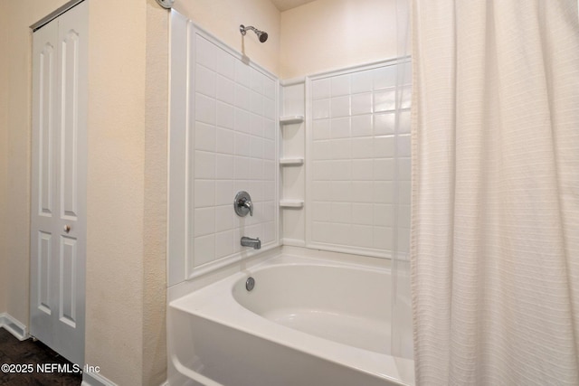 4402 Warm Springs Way, Middleburg, FL 32068 - bathroom with shower / tub combo with curtain and a textured wall