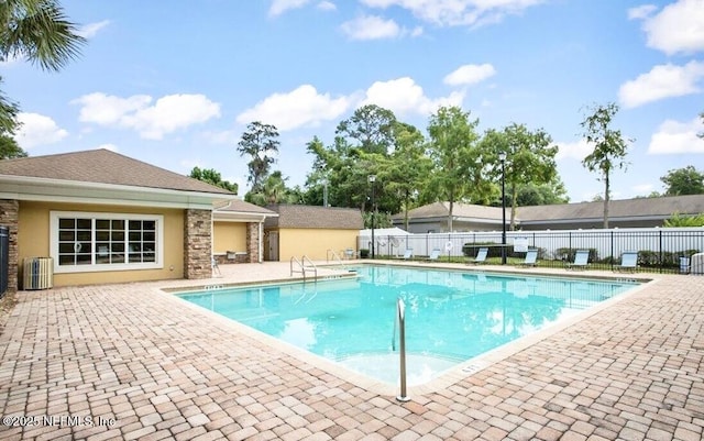 9421 Osprey Branch Trl Unit 4, Jacksonville, FL 32257 - community pool featuring cooling unit, a patio area, and fence
