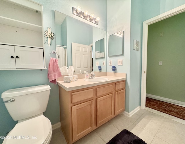 9421 Osprey Branch Trl Unit 4, Jacksonville, FL 32257 - full bathroom with vanity, toilet, tile patterned flooring, and baseboards