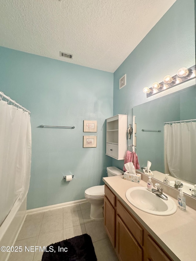 9421 Osprey Branch Trl Unit 4, Jacksonville, FL 32257 - bathroom featuring vanity, tile patterned floors, toilet, visible vents, and baseboards