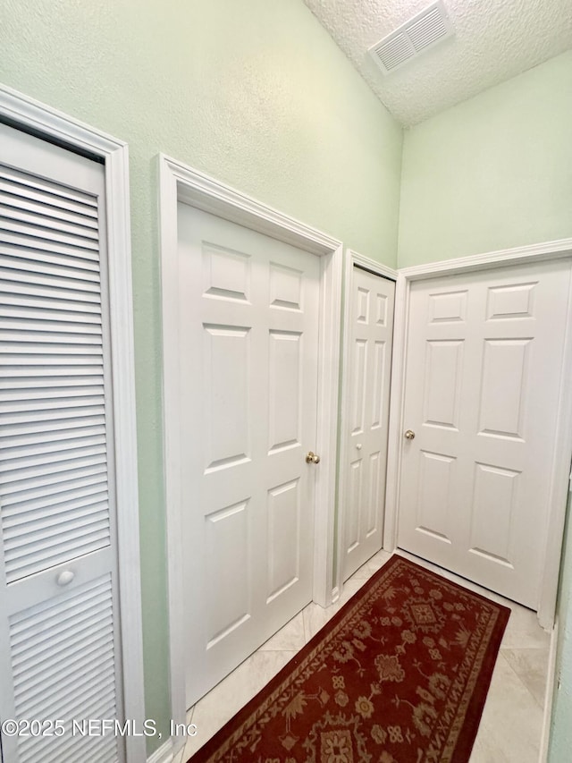 9421 Osprey Branch Trl Unit 4, Jacksonville, FL 32257 - interior space with a textured ceiling and visible vents