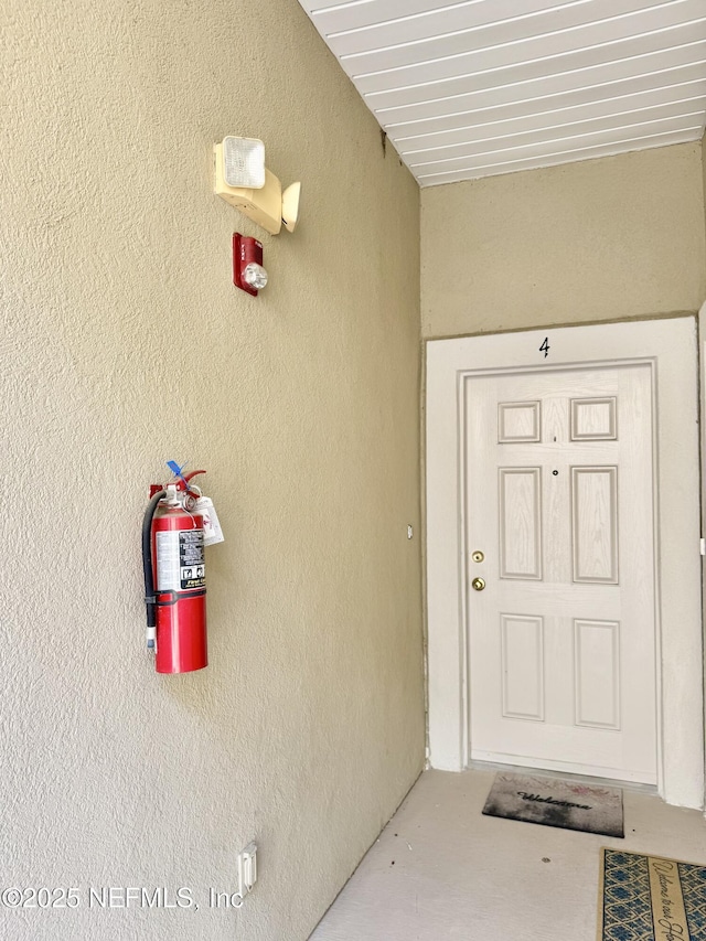 9421 Osprey Branch Trl Unit 4, Jacksonville, FL 32257 - entrance to property with stucco siding