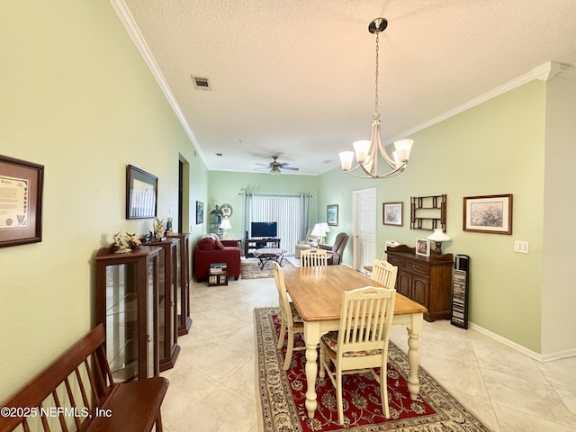 9421 Osprey Branch Trl Unit 4, Jacksonville, FL 32257 - dining area featuring light tile patterned floors, crown molding, visible vents, a textured ceiling, and ceiling fan with notable chandelier