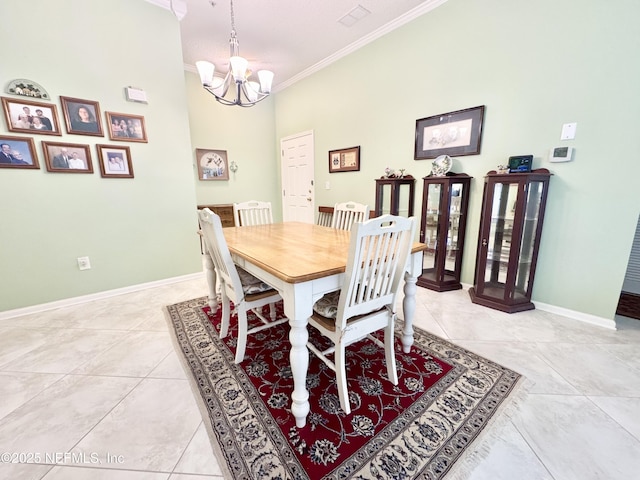 9421 Osprey Branch Trl Unit 4, Jacksonville, FL 32257 - dining area featuring crown molding, light tile patterned flooring, an inviting chandelier, and baseboards