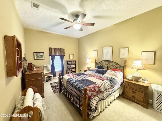 9421 Osprey Branch Trl Unit 4, Jacksonville, FL 32257 - bedroom featuring carpet, visible vents, a ceiling fan, and a textured ceiling