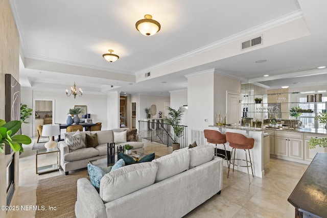 living area featuring crown molding, a chandelier, recessed lighting, a tray ceiling, and visible vents