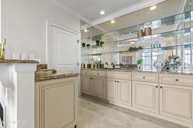 bar featuring recessed lighting, wet bar, ornamental molding, and a sink