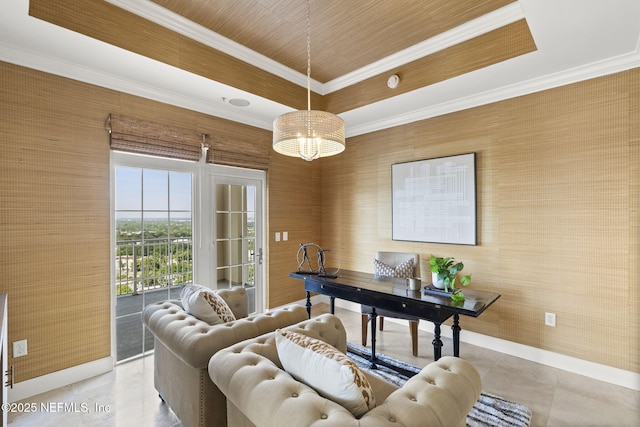 office with a raised ceiling, ornamental molding, and baseboards