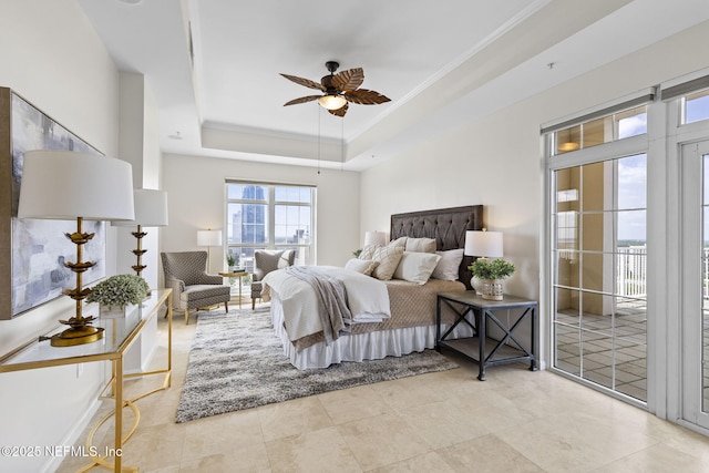 tiled bedroom featuring access to outside, a ceiling fan, a raised ceiling, and crown molding
