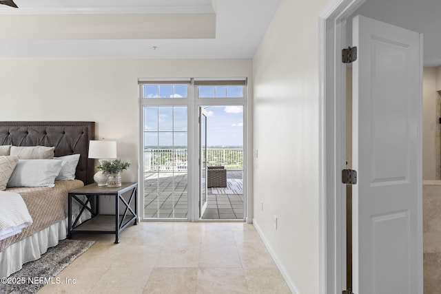 bedroom featuring baseboards, light tile patterned flooring, and access to exterior