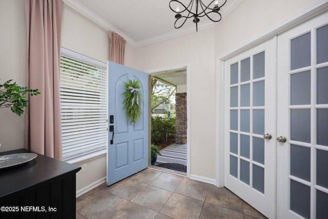 72 Whistler Trce, Ponte Vedra, FL 32081 - tiled entrance foyer with baseboards, an inviting chandelier, ornamental molding, and french doors