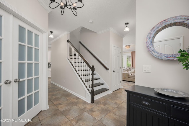 72 Whistler Trce, Ponte Vedra, FL 32081 - staircase with baseboards, an inviting chandelier, and ornamental molding