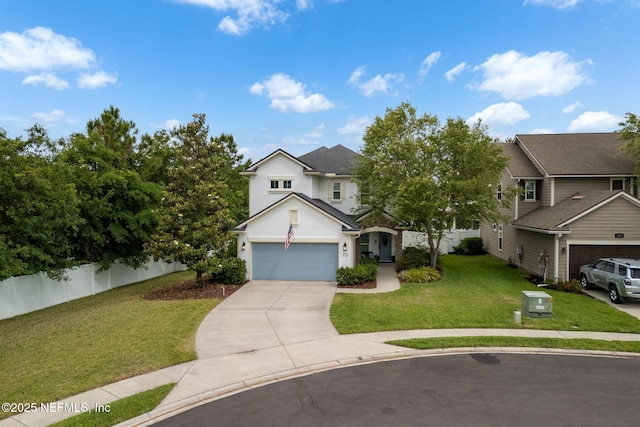 72 Whistler Trce, Ponte Vedra, FL 32081 - traditional-style house featuring fence, a front yard, stucco siding, an attached garage, and driveway