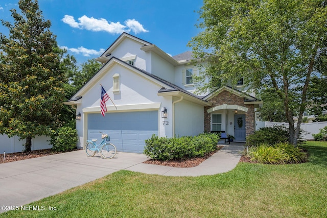 72 Whistler Trce, Ponte Vedra, FL 32081 - traditional-style house with a garage, fence, a front yard, stucco siding, and concrete driveway