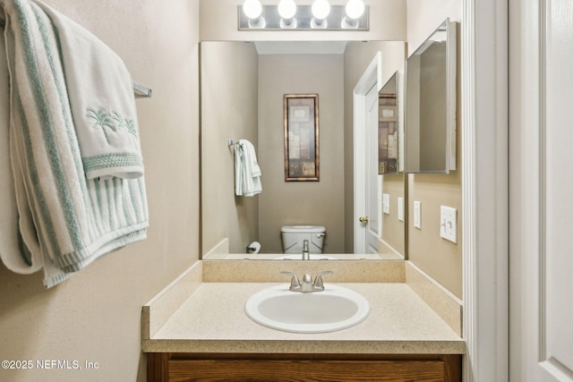 half bath with toilet and vanity