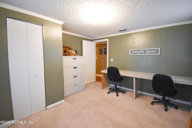 office space with light colored carpet, baseboards, visible vents, a textured ceiling, and crown molding