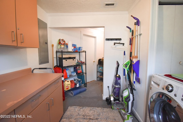 washroom with crown molding, washer / clothes dryer, visible vents, electric panel, and cabinet space
