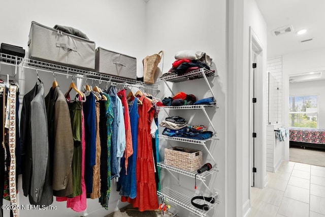 walk in closet featuring visible vents