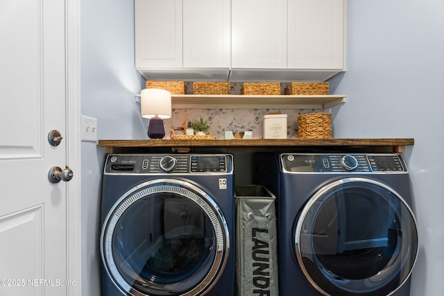laundry room with independent washer and dryer
