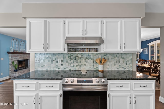 kitchen with white cabinets, stainless steel electric range oven, dark wood-style flooring, and under cabinet range hood