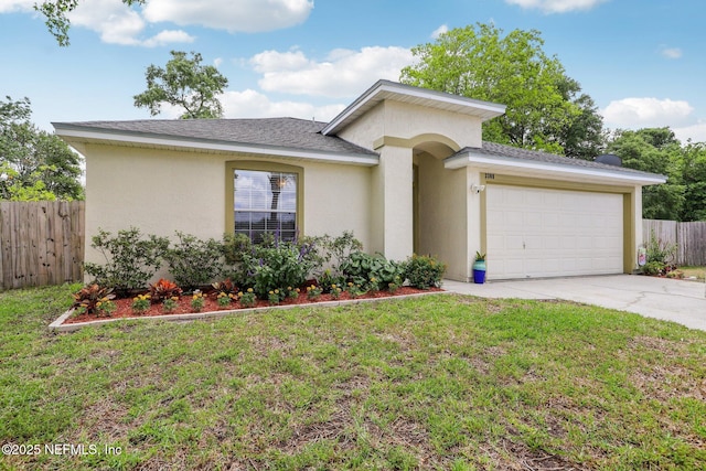 prairie-style home featuring a front yard, a garage, stucco siding, and fence