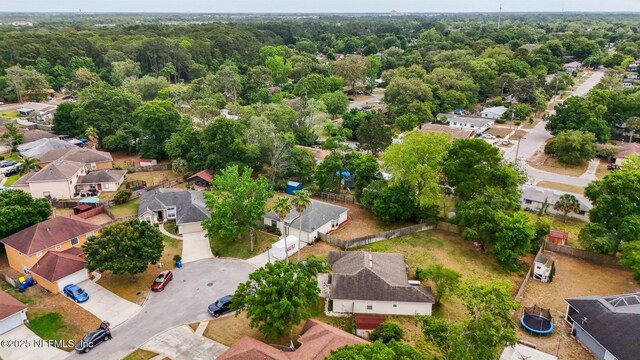 bird's eye view with a forest view and a residential view