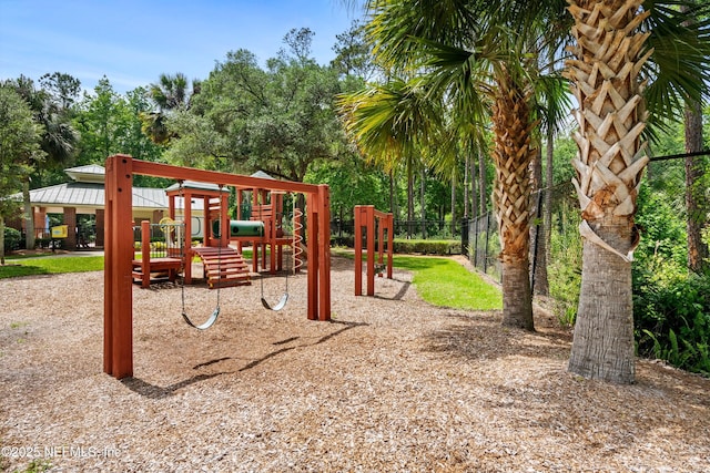community jungle gym featuring fence