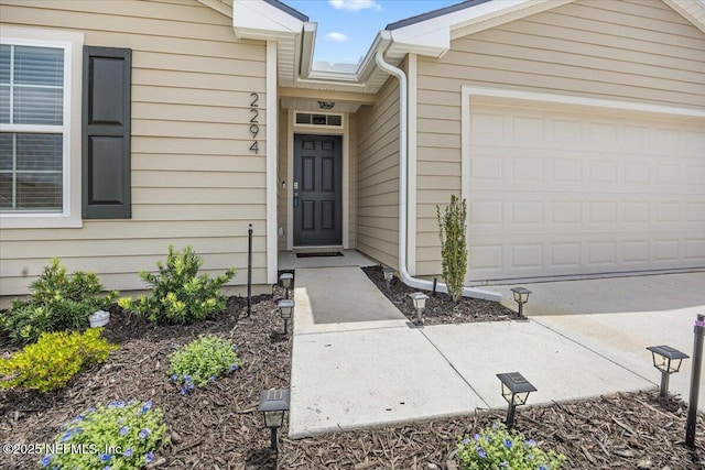 2294 Falling Star Ln, Green Cove Springs, FL 32043 - property entrance with a garage