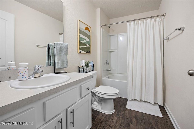 2294 Falling Star Ln, Green Cove Springs, FL 32043 - full bathroom with wood finished floors, vanity, shower / bath combination with curtain, and a textured ceiling