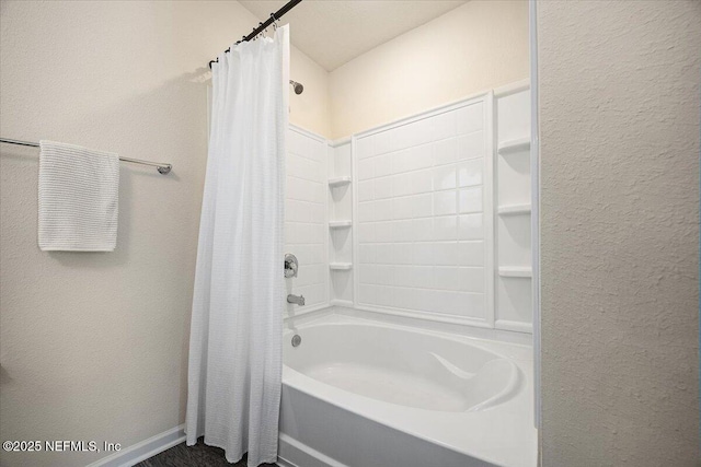 2294 Falling Star Ln, Green Cove Springs, FL 32043 - full bathroom with a textured wall and shower / bath combo