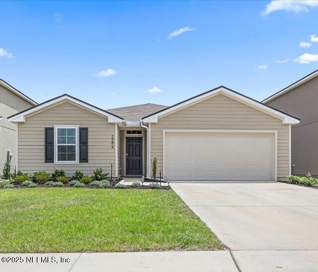 2294 Falling Star Ln, Green Cove Springs, FL 32043 - ranch-style house featuring a garage, concrete driveway, and a front lawn