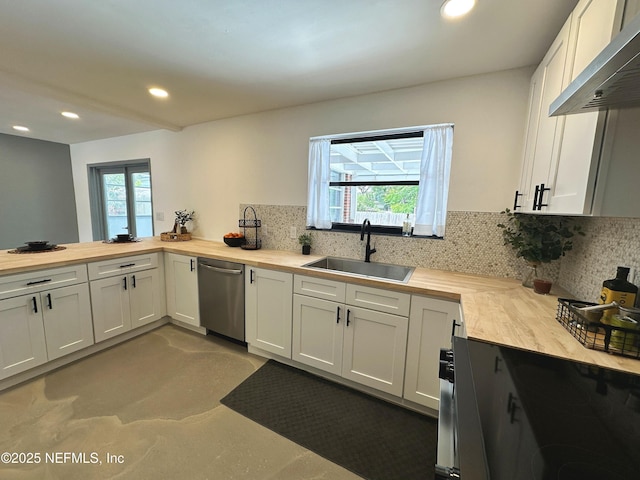 1118 Brookmont Ave E, Jacksonville, FL 32211 - kitchen featuring stainless steel dishwasher, wood counters, range hood, decorative backsplash, and recessed lighting