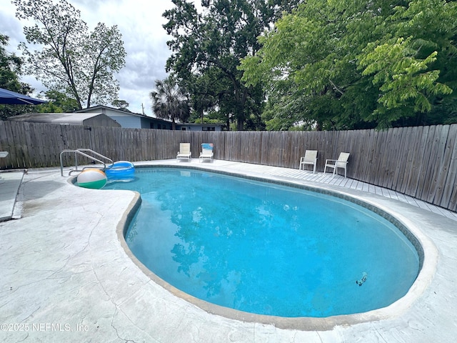 1118 Brookmont Ave E, Jacksonville, FL 32211 - view of pool with a fenced backyard and a patio area