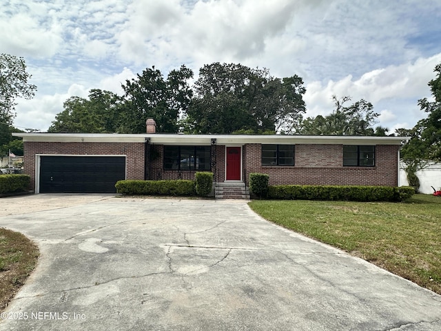 1118 Brookmont Ave E, Jacksonville, FL 32211 - single story home featuring a front yard, brick siding, driveway, a chimney, and an attached garage