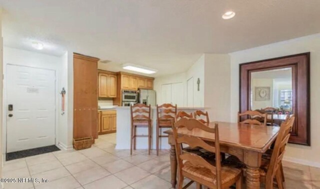 500 Sandiron Cir Unit 517, Ponte Vedra Beach, FL 32082 - dining room featuring light tile patterned flooring and baseboards