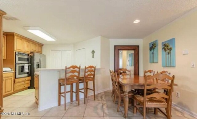 500 Sandiron Cir Unit 517, Ponte Vedra Beach, FL 32082 - dining room featuring light tile patterned floors, baseboards, and recessed lighting