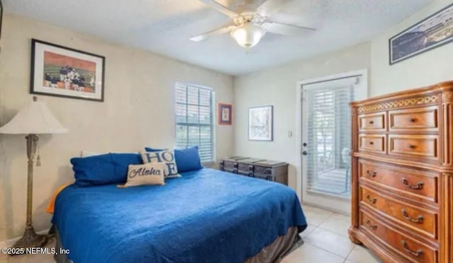 500 Sandiron Cir Unit 517, Ponte Vedra Beach, FL 32082 - bedroom with light tile patterned floors, a ceiling fan, and access to exterior