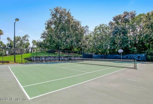 500 Sandiron Cir Unit 517, Ponte Vedra Beach, FL 32082 - view of tennis court with fence