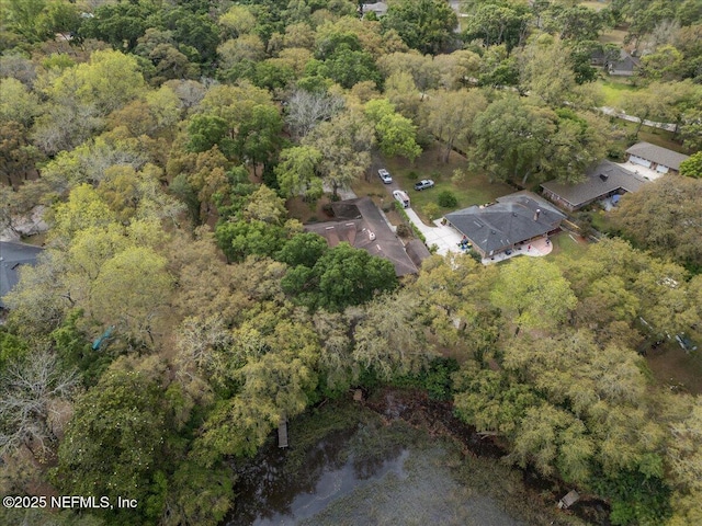 aerial view with a wooded view