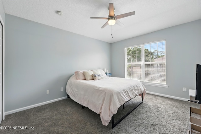 157 Jardin De Mer Pl Unit 157, Jacksonville Beach, FL 32250 - bedroom featuring baseboards, carpet, and a textured ceiling